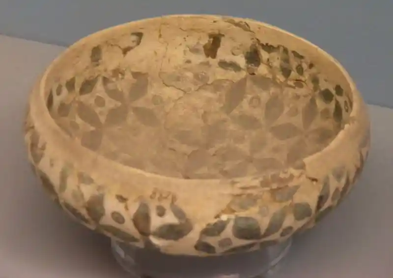 Clay bowl with overlapping circles and crosses design